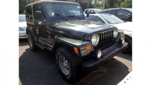 Why Did Two Dealers Go Bananas For This 24-Year-Old Rusty Jeep Wrangler