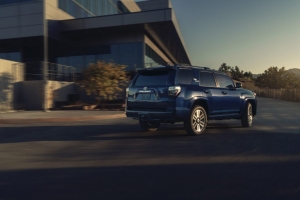 Blue-2022-Toyota-4Runner-TRD-Sport-driving-by-a-large-building-1024×683.jpg
