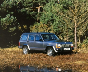 Gray-1993-Jeep-Cherokee-parked-next-to-a-forest-1024×832.jpg